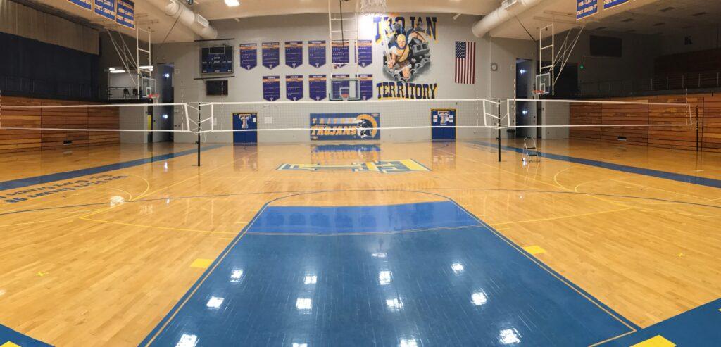 shared-volleyball-poles-on-indoor-volleyball-court